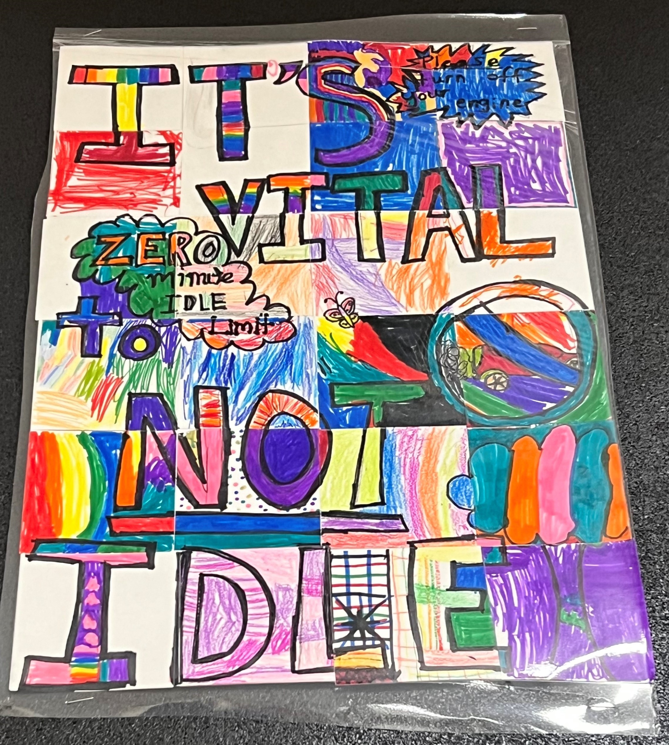 Children's poster that is colorful and says It's Vital not to Idle